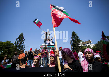 August 26, 2017 - Gaza City, The Gaza Strip, Palestine - The Palestinians are participating in a rally organized by the Popular Front for the Liberation of Palestine (PFLP) to commemorate the anniversary of the founder of the movement, Abu Ali Mustafa, and to end the division in Gaza City. (Credit Image: © Mahmoud Issa/Quds Net News via ZUMA Wire) Stock Photo