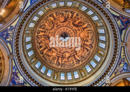 St Paul's Cathedral interior, view up to ceiling murals, paintings, mosaics and gilded decorations, inner dome, London, England Stock Photo