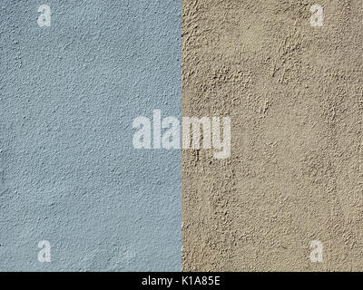 Two fragments of the house wall are covered with blue and yellow textured plaster Stock Photo