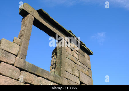 Open window of an old abandoned farmhouse at The Roaches, Peak District National Park, Staffordshire, UK Stock Photo