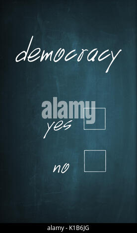 Conceptual text "Democracy" written with chalk on a dirty blackboard to select one of the empty yes or no selection boxes. Stock Photo