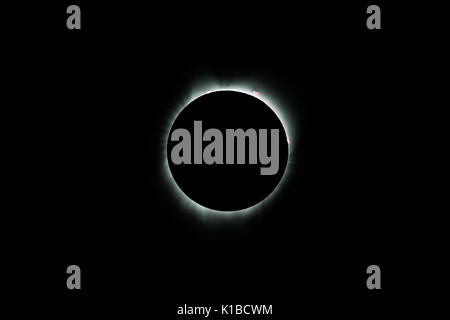 During a total solar eclipse the moon completely covers the sun. This incredible event can be seen on average every 18 months from somewhere on Earth. Stock Photo