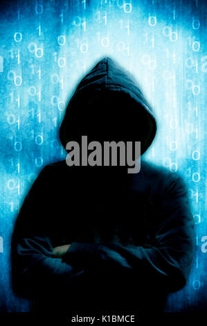 mysterious hacker in hood Stock Photo