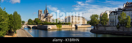 Morning panoramic view of Notre Dame de Paris cathedral and banks of the Seine River. Ile de la Cite, Ile Saint-Louis, Paris, France Stock Photo