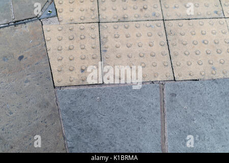 Bland, block paved pavement, urban setting background Stock Photo