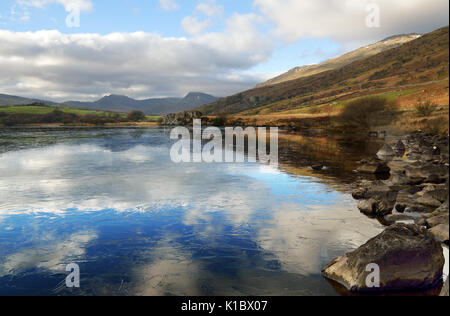 Llynnau Mymbyr are two lakes located in Dyffryn Mymbyr valley in Snowdonia and are here seen with mount Snowdon in the background. Stock Photo