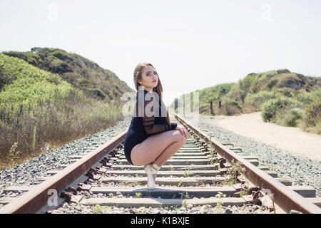 Dancer on the tracks Stock Photo