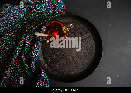 Different types of tea, green tea, peony and ginger tea, rose bud and wild flowers tea on dark wooden background with copyspace Stock Photo