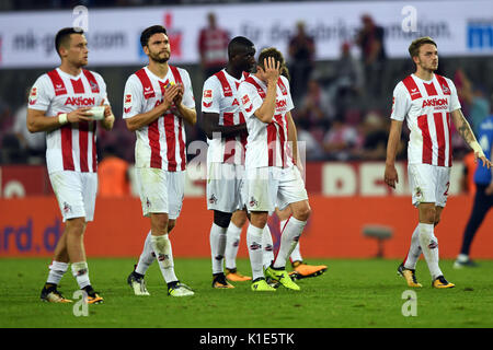 Cologne's team stands on the field after losing the German Bundesliga soccer match between 1. FC Cologne and Hamburger SV in the RheinEnergieStadium in Cologne, Germany, 25 August 2017. Photo: Federico Gambarini/dpa Stock Photo