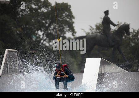 Moscow, Russia. 25th of August, 2017. A wakeboard rider jumps during openin the wake park near the Red square in the center of Moscow, Russia Credit: Nikolay Vinokurov/Alamy Live News Stock Photo