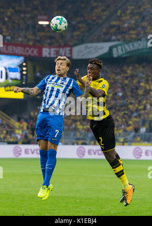 Dortmund, Germany. 26th Aug, 2017. Berlin's Alexander Esswein and Dortmund's Dan-Axel Zagadou (R) pictured in an aerial duel during the Bundesliga match pitting Borussia Dortmund vs Hertha BSC at the Signal Iduna Park in Dortmund, Germany, 26 August 2017. Photo: Guido Kirchner/dpa/Alamy Live News Stock Photo