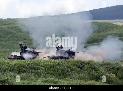 Gotemba, Japan. 27th Aug, 2017. Japanese Ground Self-Defense Forces type-87 self-propelled anti-aircraft guns fire during an annual military exercise at the Higashi-Fuji firing range in Gotemba, at the foot of Mt. Fuji in Shizuoka prefecture on Sunday, August 27, 2017. The annual drill involves some 2,400 personnel, 80 tanks and armoured vehicles. Credit: Yoshio Tsunoda/AFLO/Alamy Live News Stock Photo