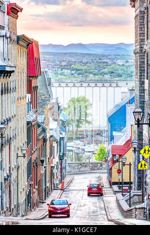 Quebec City, Canada - May 31, 2017: Old town street with aerial view of colorful sunset Stock Photo