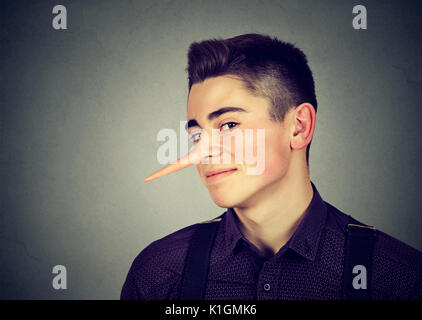 Liar funny looking young man Stock Photo