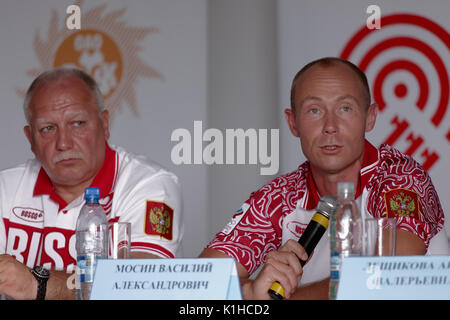 Moscow, Russia - July 09, 2012: Shooter Vasily Mosin (right) during the press conference before the London Olympics in the Lisya Nora sports complex.  Stock Photo