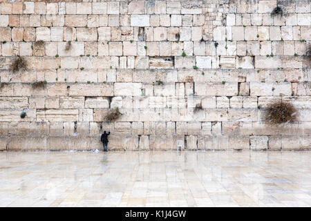 The Western Wall in Jerusalem, empty of people during snow Stock Photo