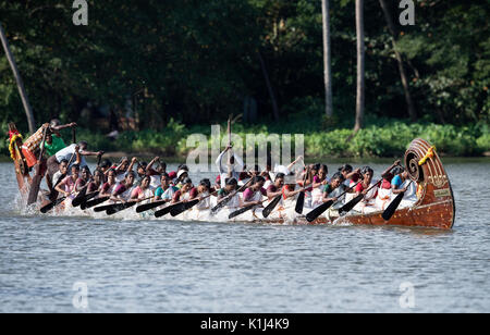 The image of women  rowing Snake boat in Nehru boat race day, Allaepy, Punnamda Lake, Kerala India Stock Photo