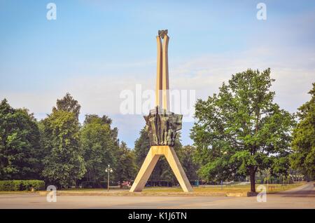 TYCHY, POLAND - JULY 7, 2017: Icon of Tychy city in Poland. Monument of struggle and work in a city park. Stock Photo