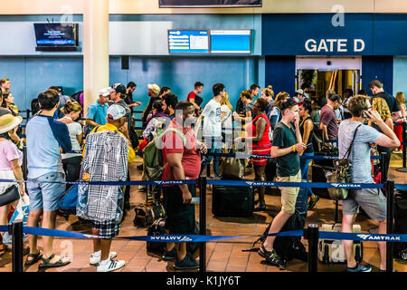 Washington DC, USA - July 1, 2017: Inside Union Station in capital city with people standing in line queue for Amtrak train Stock Photo