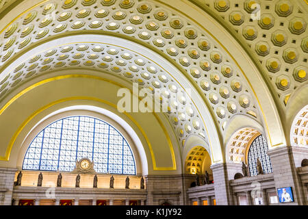 Washington DC, USA - July 1, 2017: Inside Union Station in capital city with transportation signs and people walking Stock Photo
