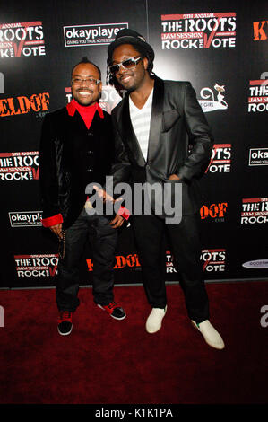 (L-R) apl.de.ap,will.i.am Black Eyed Peas attending 5th annual Roots Jam Key Club Hollywood,Ca. Stock Photo