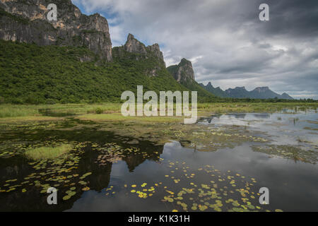 Khao Sam Roi Yot National Park, Thailand. Khao Sam Roi Yot means 'The mountain with three hundred peaks' and refers to a series of limestone hills alo Stock Photo