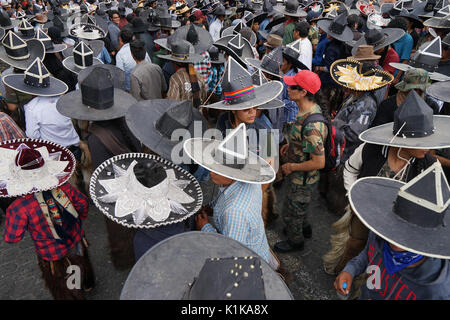June 29, 2017 Cotacachi, Ecuador: Kichwa men during occupy the main square event at Inti Raymi Stock Photo
