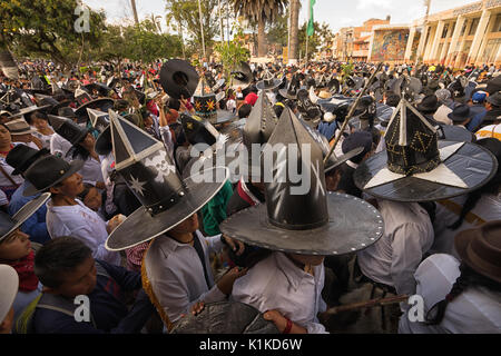 June 29, 2017 Cotacachi, Ecuador: men wearing extra large hats during Inti Raymi celebration Stock Photo