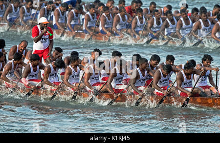 The image of men rowing Snake boat in Nehru boat race day, Allaepy, Punnamda Lake, Kerala India Stock Photo