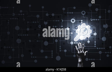 Close of human hand touching with finger setting glowing icon Stock Photo