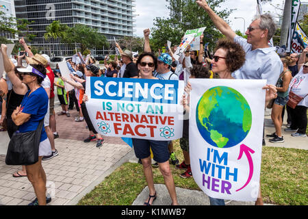 Miami Florida,Museum Park,March for Science,protest,rally,sign,protester,marching,posters,signs,woman female holding,teacher,FL170430150 Stock Photo
