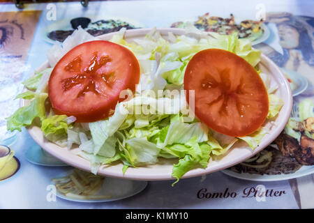 Miami Florida,Downtown,El Cacique,restaurant restaurants food dining eating out cafe cafes bistro,Cuban food,dining,salad,sliced tomato,visitors trave Stock Photo