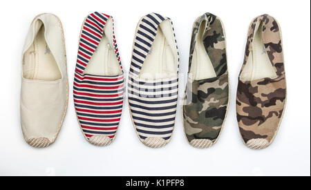 Four different colors of Platform Slipper Espadrille Flats shot from above Stock Photo