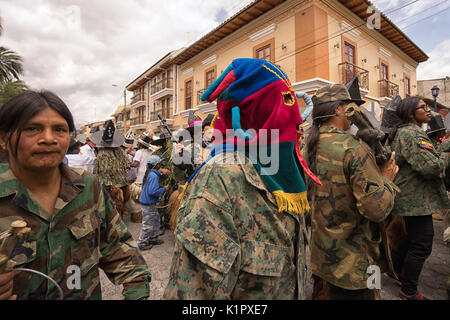 June 24,2017 Cotacachi, Ecuador; men participating at Inti Raymi dances on the street Stock Photo