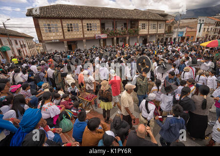 July 24, 2017 Cotacachi, Ecuador: indigenous dancers filling up the main plaza at Inti Raymi celebration Stock Photo