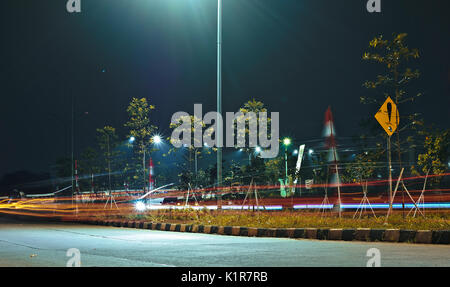 Bogor, Indonesia - August 22, 2017: Street at night in Cibinong area, Bogor city, Indonesia. Stock Photo