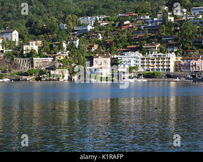 ASCONA travel city in SWITZERLAND with scenic view of beauty Lake Maggiore at canton of Ticino and slope of alpine mountain range landscape at Alps. Stock Photo