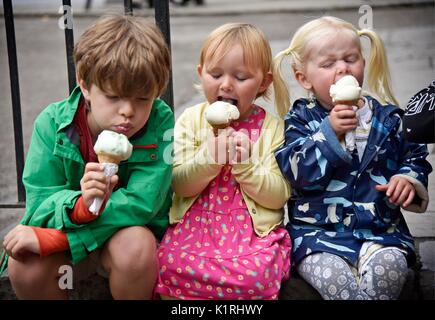 Limerick County Clare  Ireland Children eating ice cream at Bunratty Castle. Stock Photo