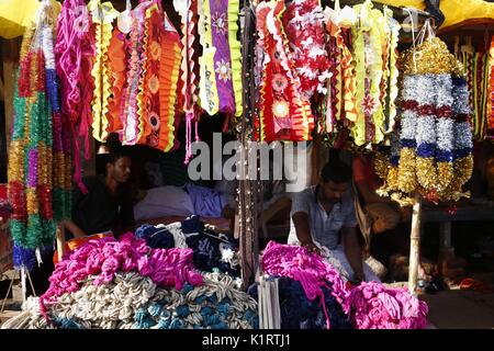 Dhaka, Bangladesh. 27th Aug, 2017. Bangladeshi vendor waits for customers to sell color les ribbons for animals at a cattle market, on the outcast of Dhaka. Credit: Md. Mehedi Hasan/ZUMA Wire/Alamy Live News Stock Photo