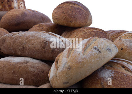 Freshly baked loaves of multigrain and sourdough bread Stock Photo