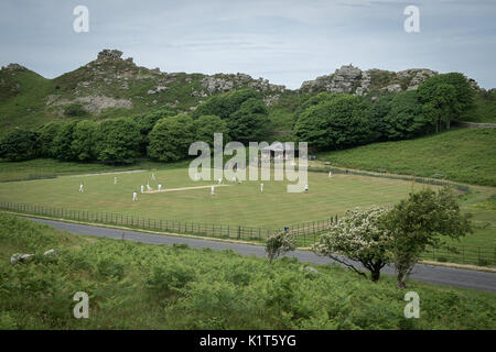 The annual friendly match between Cravens Cavaliers and Lynton & Lynmouth Cricket Club is played at the ground based inside the Valley of Rocks, North Devon, on Saturday August 5th, 2017 Stock Photo