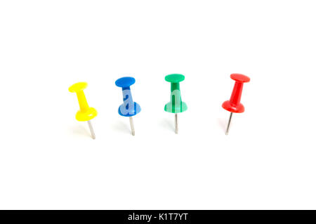 Four color push pin and on isolated white background Stock Photo