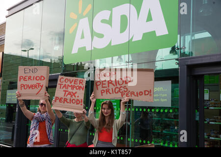 London, UK. 24th August, 2017. Laura Coryton (r), founder of Stop Taxing Periods, protests with campaigners at an Asda supermarket in Stepney Green. Stock Photo
