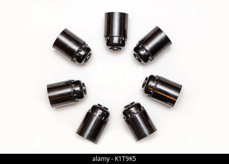 Set of plastic and ceramic electric cartriges for bulb isolated on white. Top view. Stock Photo