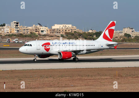 Air travel in the European Union. CSA Czech Airlines Airbus A319 passenger jet plane on the runway while taking off from Malta Stock Photo