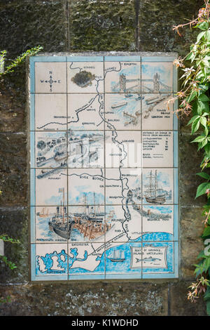 A map painted on tiles showing the town of Arundel and the course of the River Arun fixed to a wall in Arundel, West Sussex, England. Stock Photo