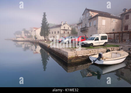 The historic center of Perast. Beautiful reflection in the calm waters of the sea. Perast, Montenegro Stock Photo