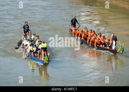 Competitors take part in a Dragon Boat Race to celebrate the Dragon ...