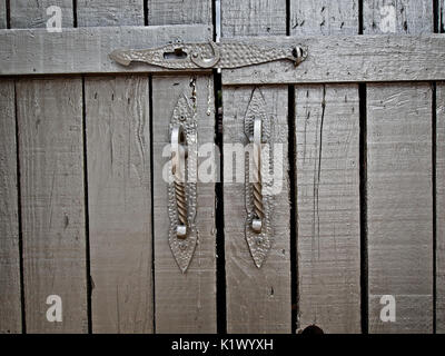 Spring TX USA - July 12, 2017  -  Old Gray Shutters With Hardware in Old Town Spring TX Stock Photo