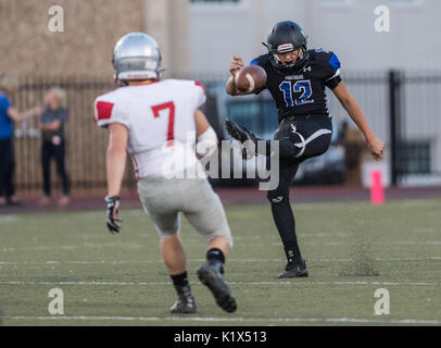 Football action with Trinity vs. University Prep High School in Redding, California. Stock Photo